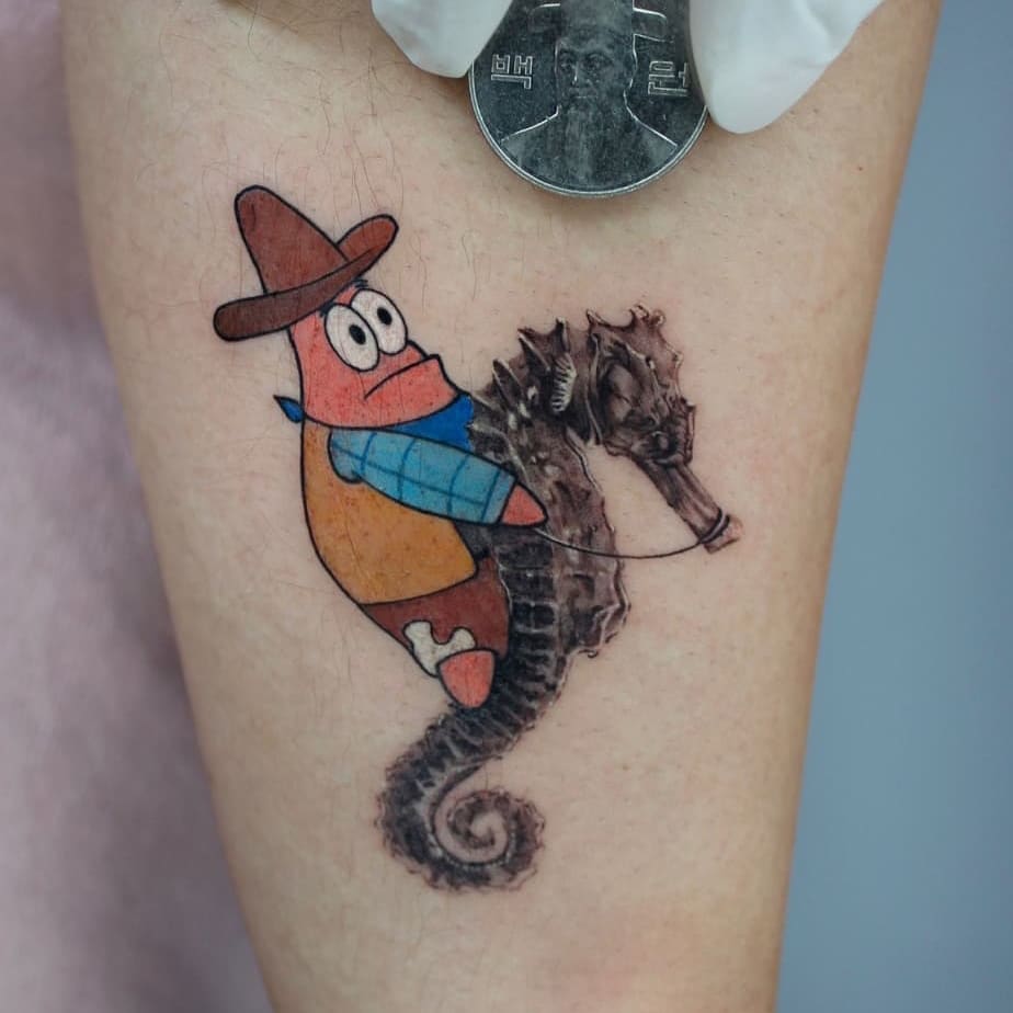 A colorful tattoo of a cartoon character riding a seahorse.
